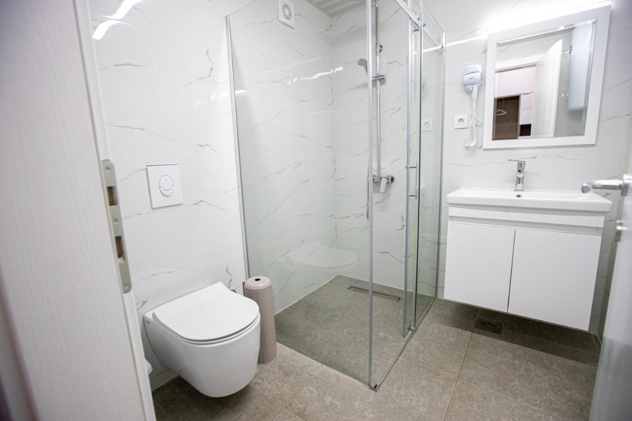 Queens Central Apartments أوهغيد المظهر الخارجي الصورة